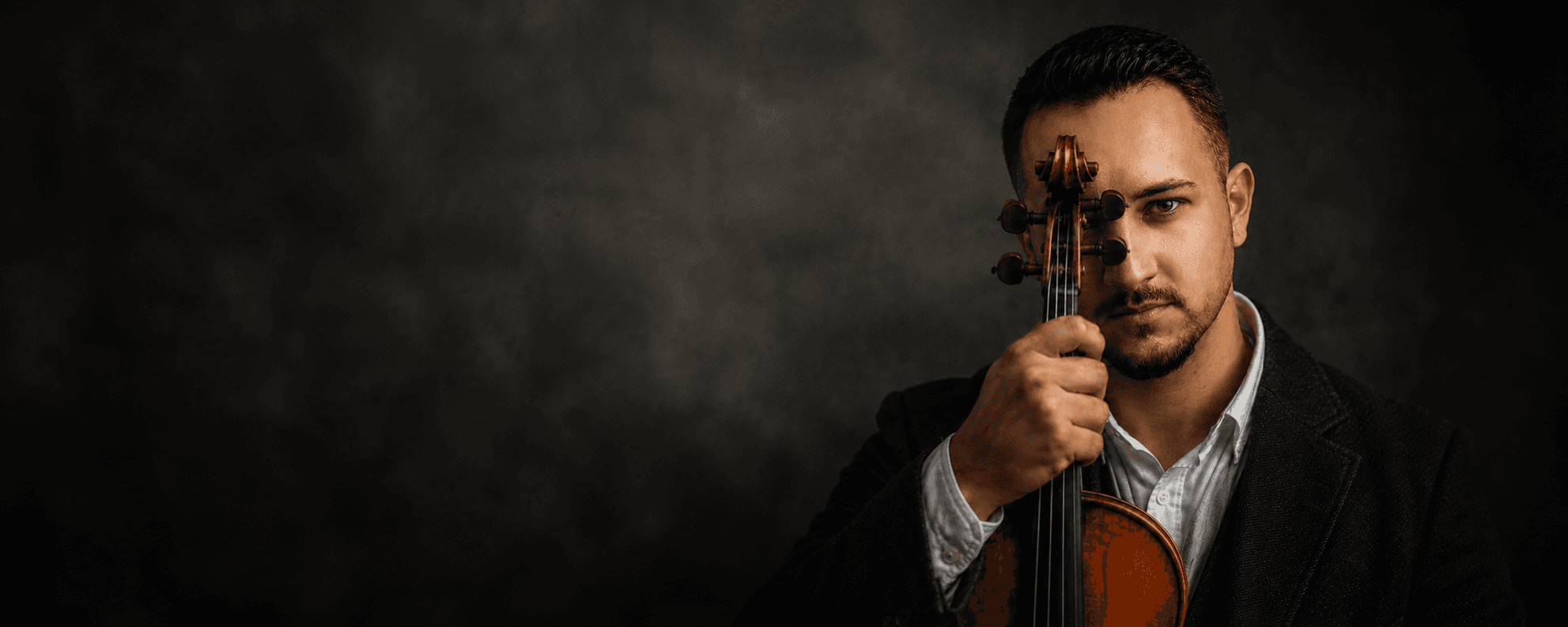 Arsim Gashi, professional violinist performing with violin